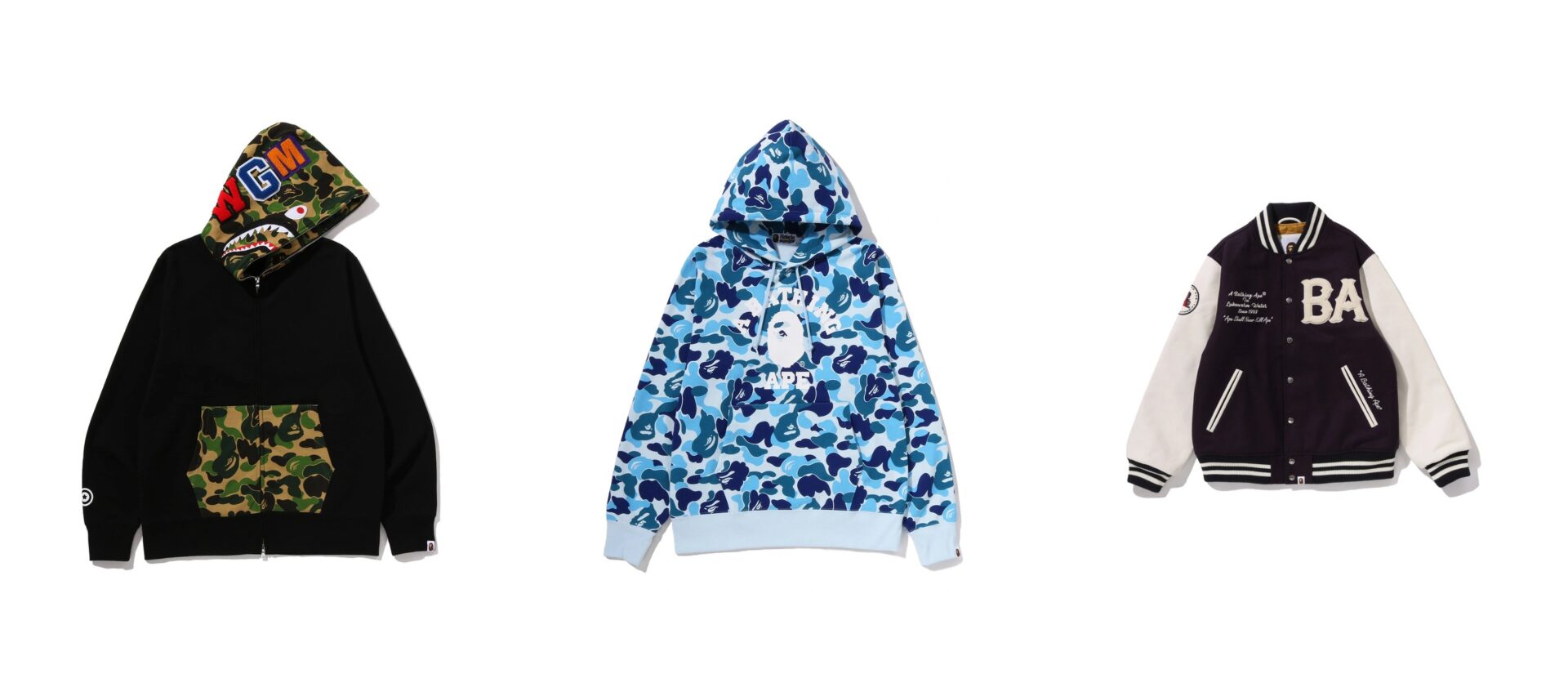Bape shark full-zip hoodie, ABC camo pullover hoodie and a varsity jacket side by side